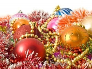 6004692-christmas-colorful-decoration--baubles-tinsel-and-beads-over-white